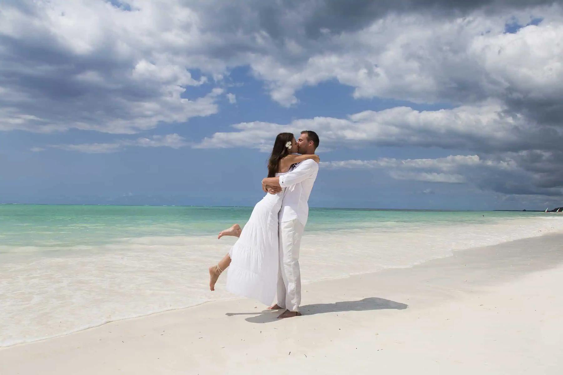 A couple at the water's edge