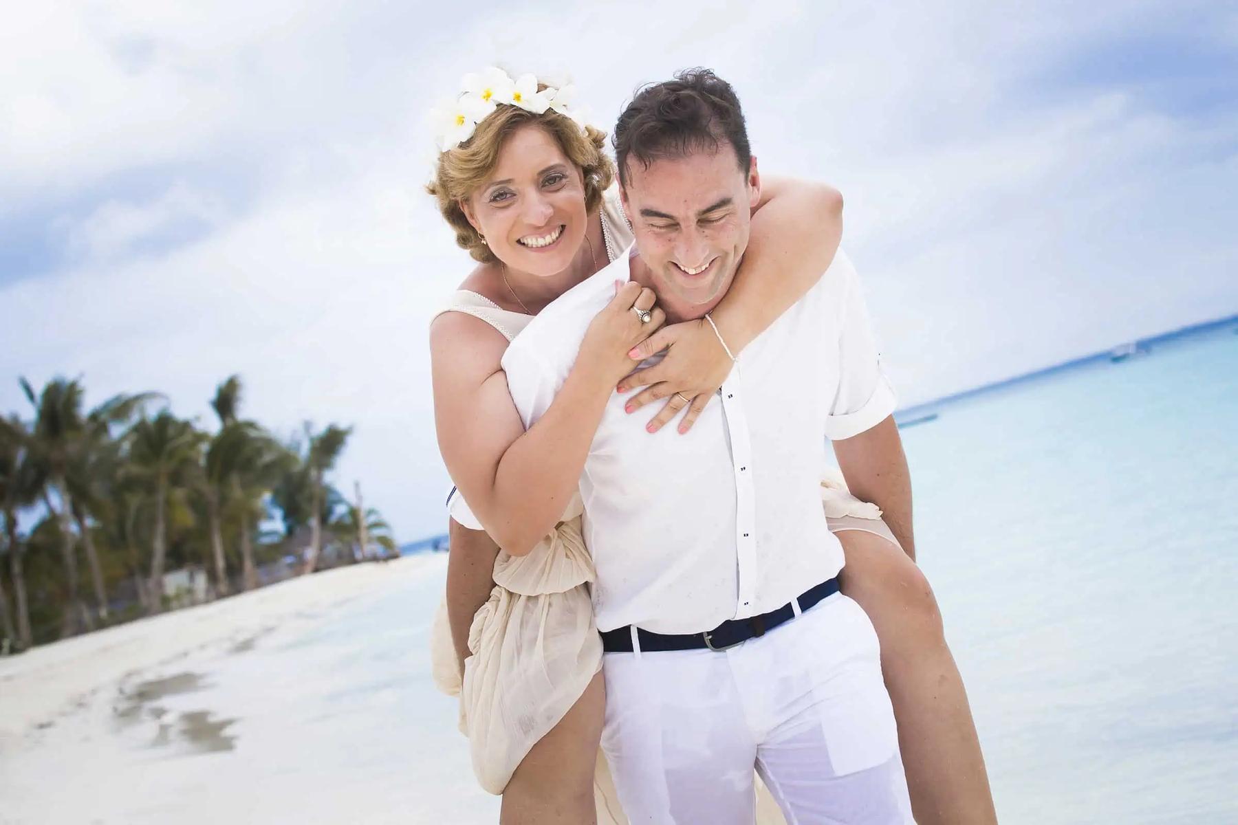 A joyful embrace on the sand